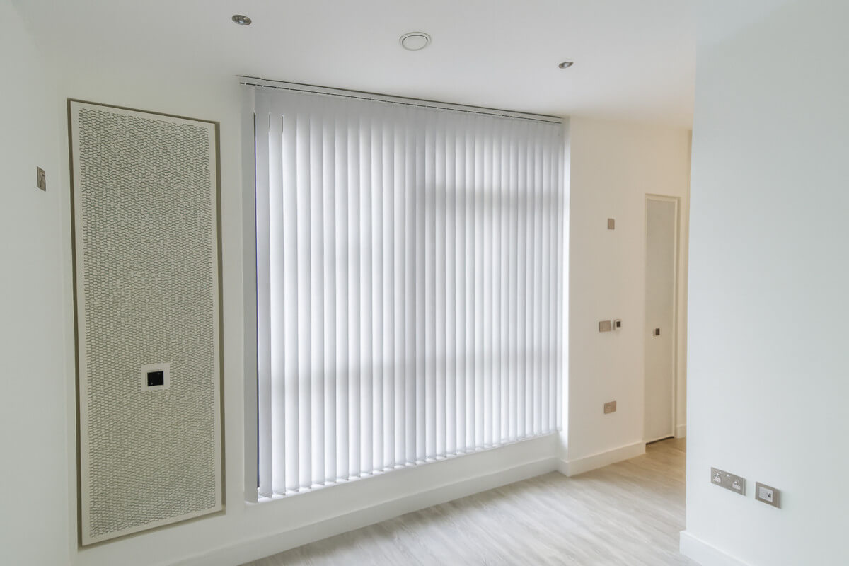 white vertical blinds in an office